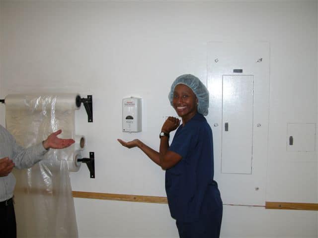 a women using hand sanitiser